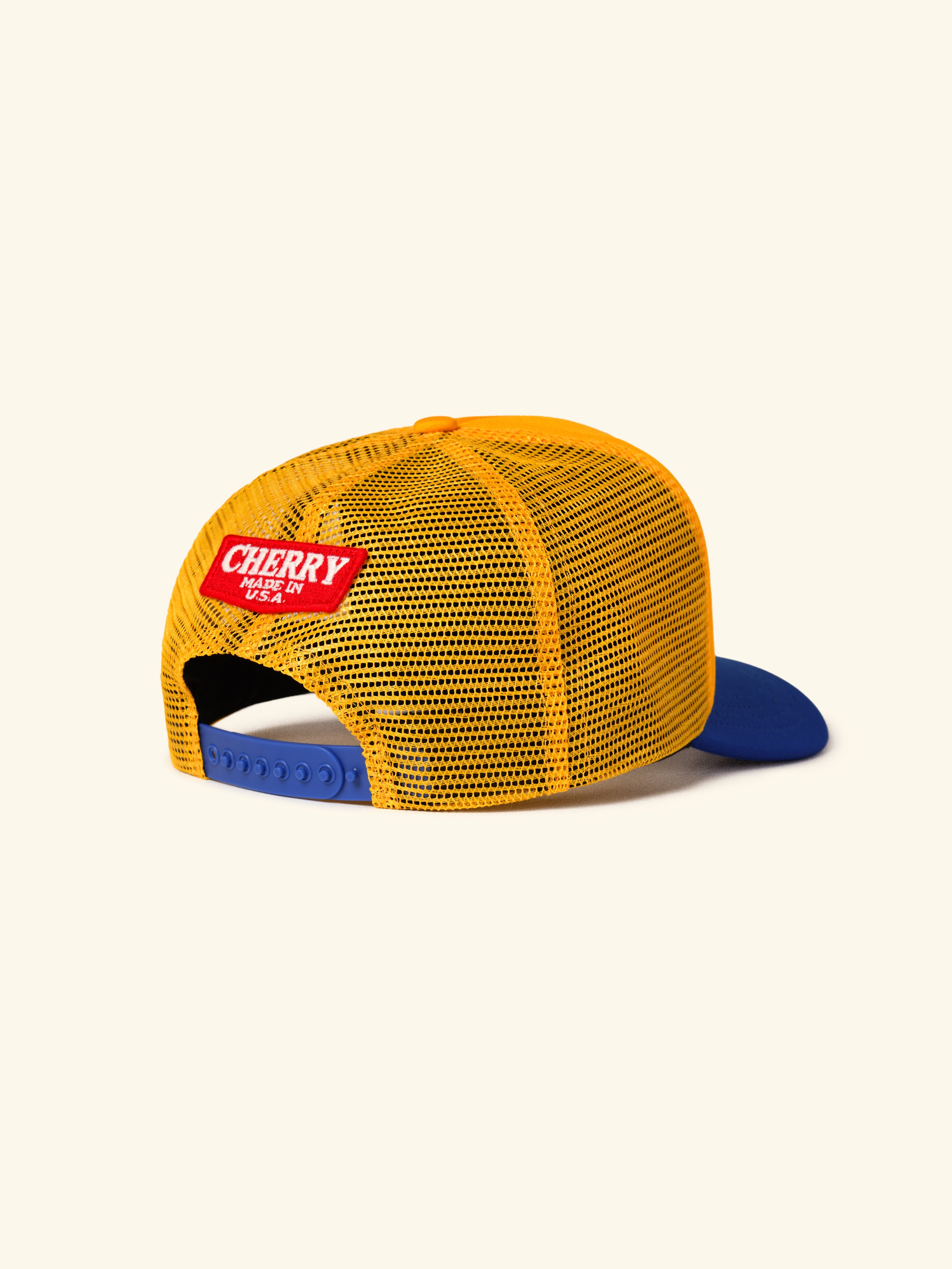 Cherry x Wrangler Trucker Hat (Yellow/Blue)