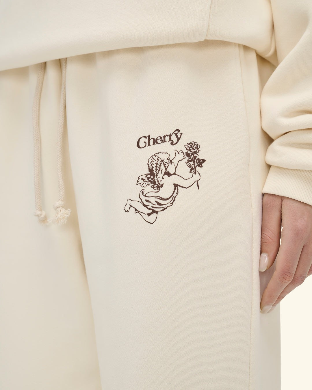 Cherry x GDC Angel Men's Sweatpants (Cream)